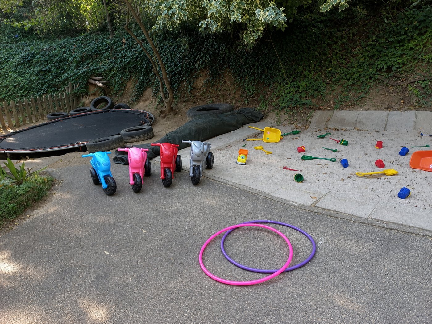 The play yard, with the bikes lined up and the sand pit ready to go